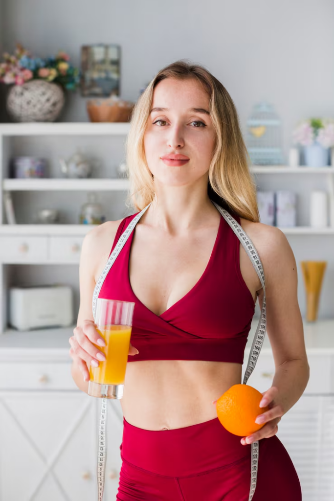 sporty-woman-kitchen-with-healthy-juice
